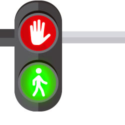 Image d'un feu de circulation. Le rouge indique d'arrêter, avec un symbole de main, tandis que le vert invite les piétons à avancer.